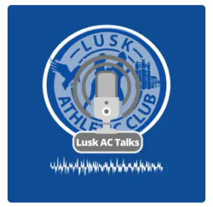 The Lusk Talks Logo, is an old Skool radio /mike in front of the Lusk AC logo, with a sound wave at the bottom of the blue image